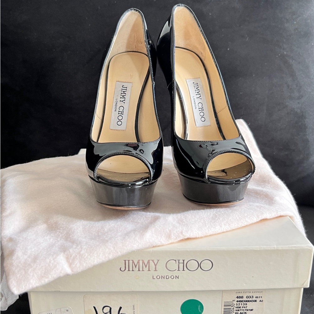 Jimmy Choo black heels. Size 35 1/2. Peep-toe platform patent leather heels.